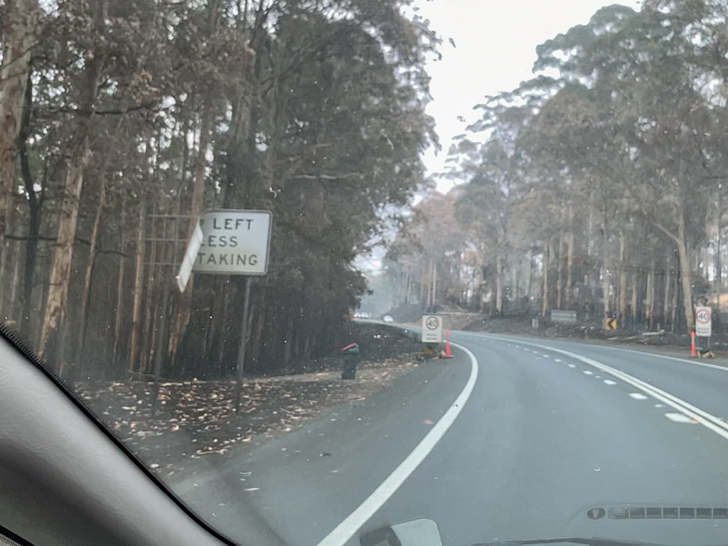 currawong_fire_melted_sign